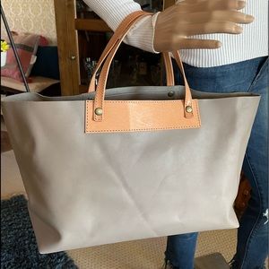 Handmade leather purse from repurposed material. Made in Japan